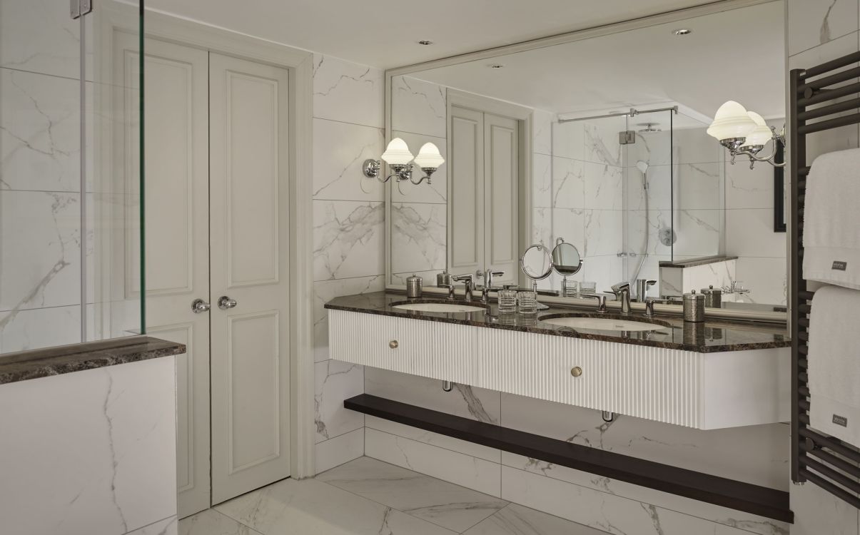 White marble double vanity bathroom in The College Green Hotel Dublin