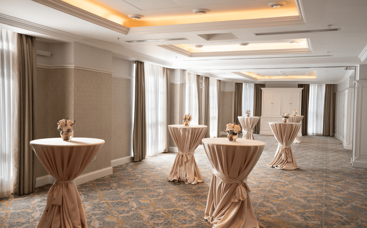 Drinks receptions set up with singular pods tables in The College Green Hotel Dublin